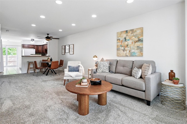 3300 W Florida Ave Unit 117, Denver, CO 80219 - living area featuring light colored carpet, recessed lighting, and ceiling fan