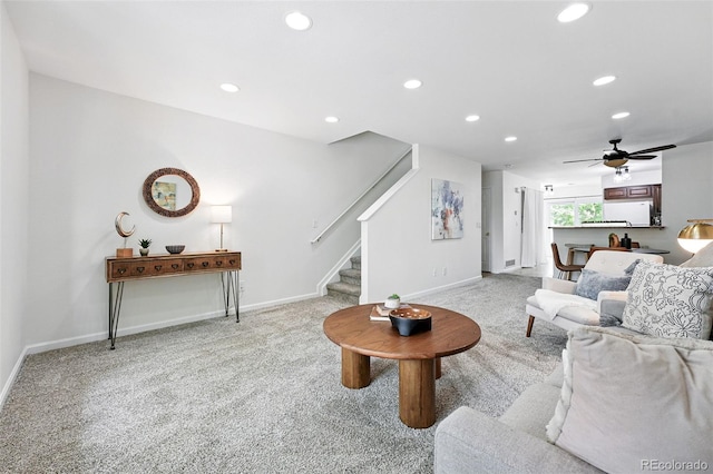 3300 W Florida Ave Unit 117, Denver, CO 80219 - living area featuring carpet flooring, stairs, recessed lighting, baseboards, and a ceiling fan