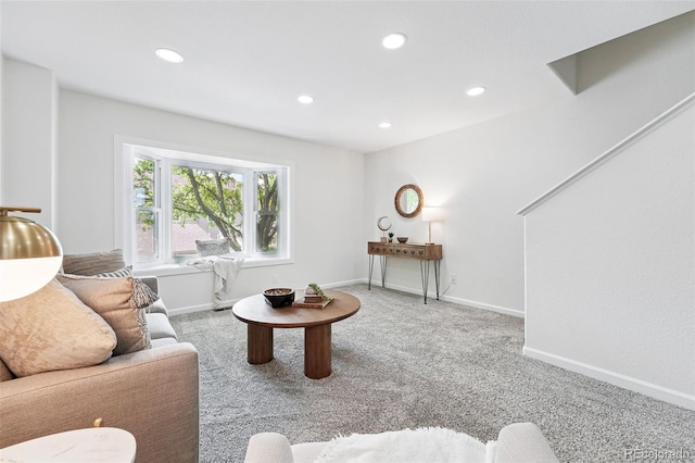 3300 W Florida Ave Unit 117, Denver, CO 80219 - carpeted living area featuring recessed lighting and baseboards