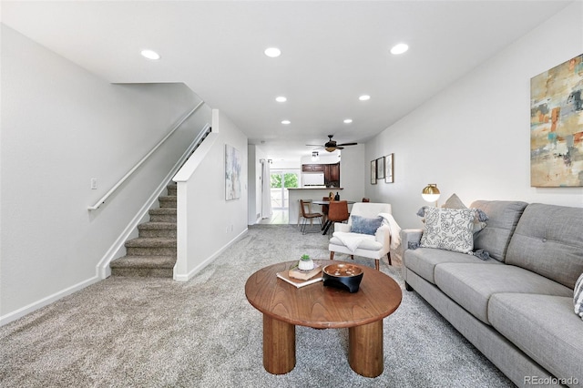 3300 W Florida Ave Unit 117, Denver, CO 80219 - living area with carpet flooring, stairs, recessed lighting, ceiling fan, and baseboards