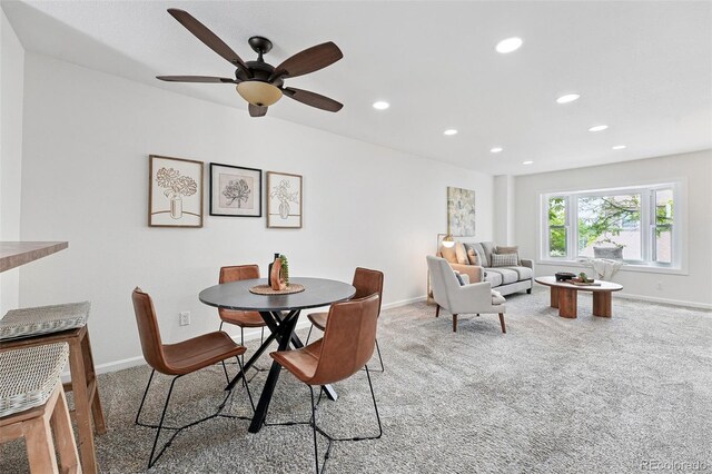 3300 W Florida Ave Unit 117, Denver, CO 80219 - dining room with light colored carpet, recessed lighting, baseboards, and ceiling fan