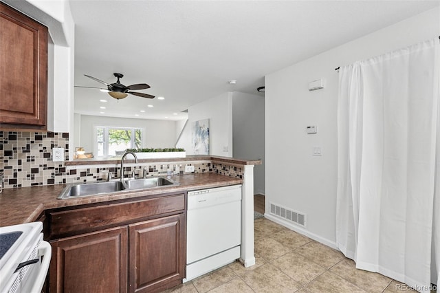 3300 W Florida Ave Unit 117, Denver, CO 80219 - kitchen with white appliances, a sink, decorative backsplash, ceiling fan, and light tile patterned floors