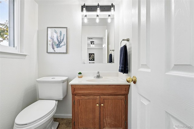 3300 W Florida Ave Unit 117, Denver, CO 80219 - half bath with vanity and toilet