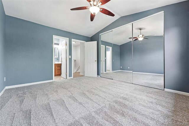 3300 W Florida Ave Unit 117, Denver, CO 80219 - unfurnished bedroom featuring lofted ceiling, carpet floors, baseboards, a closet, and ceiling fan