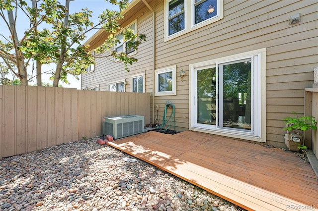 3300 W Florida Ave Unit 117, Denver, CO 80219 - wooden deck featuring central air condition unit