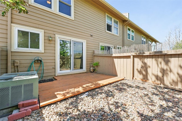 3300 W Florida Ave Unit 117, Denver, CO 80219 - wooden terrace with central AC unit