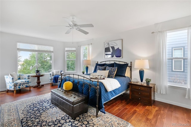 bedroom featuring ceiling fan and hardwood / wood-style flooring