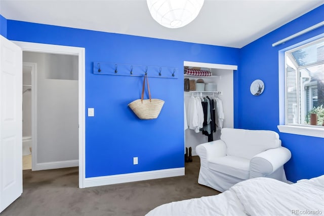 13701 E Marina Dr Unit B, Aurora, CO 80014 - carpeted bedroom featuring a closet and baseboards