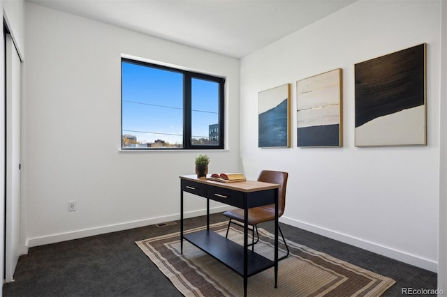 office area with dark colored carpet