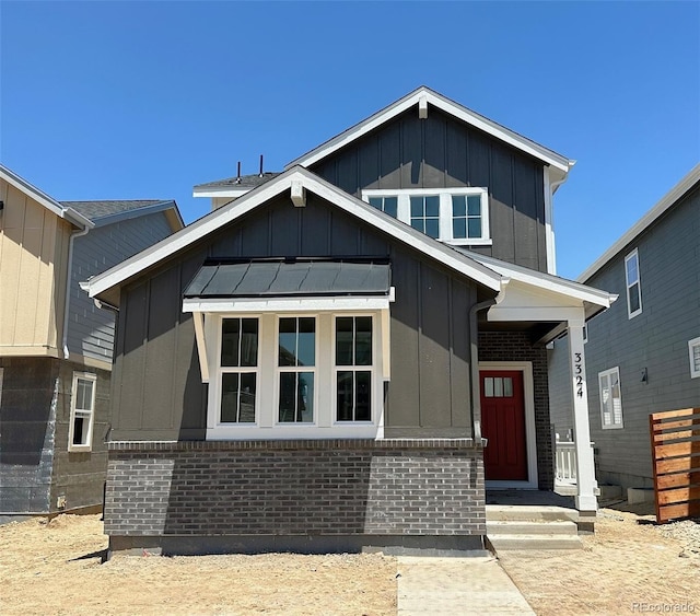 3324 N Catawba Way, Aurora, CO 80019 - view of front of home with board and batten siding and brick siding
