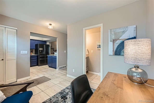 living room with light tile patterned floors