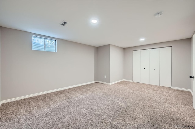 basement featuring carpet flooring