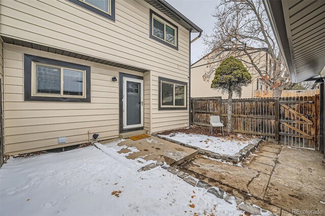 view of snow covered patio