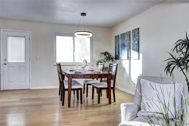 dining room featuring light hardwood / wood-style flooring