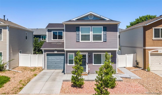 4695 Andes St, Denver, CO 80249 - view of front of house with concrete driveway and a garage