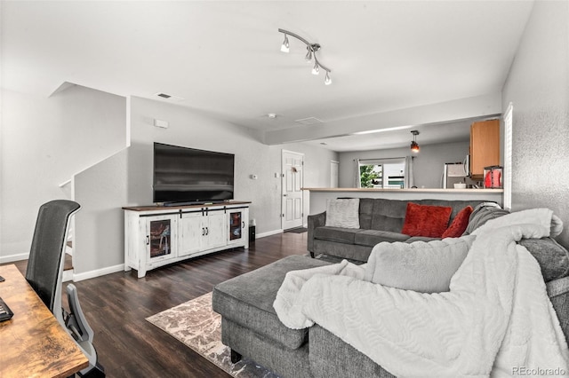 4695 Andes St, Denver, CO 80249 - living room featuring dark wood-style floors and an office area