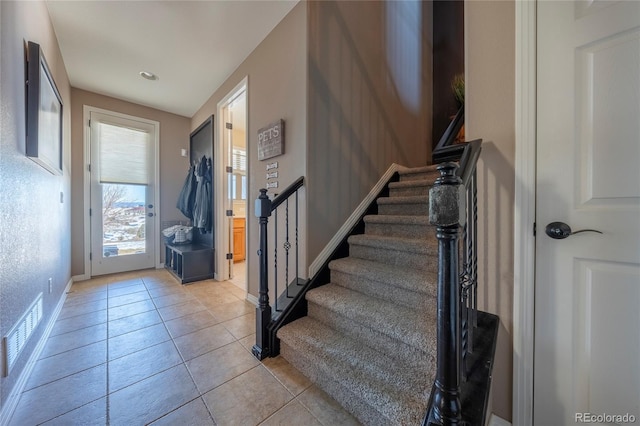 view of tiled entrance foyer