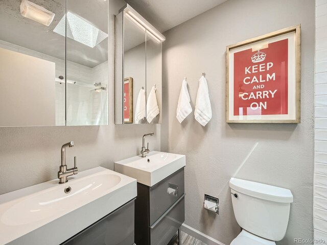 1370 Sandstone Dr Unit 12, Vail, CO 81657 - bathroom with two vanities and a shower with door