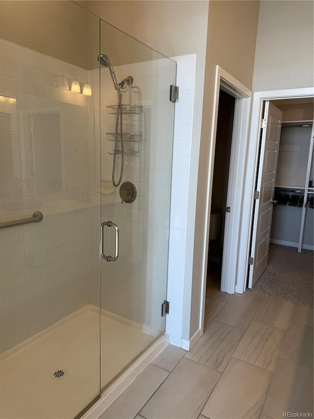 bathroom with an enclosed shower