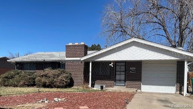 ranch-style home with a garage