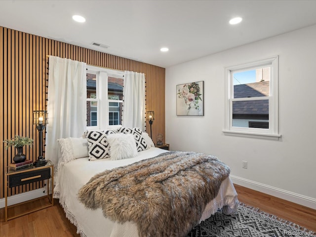 bedroom featuring wood-type flooring