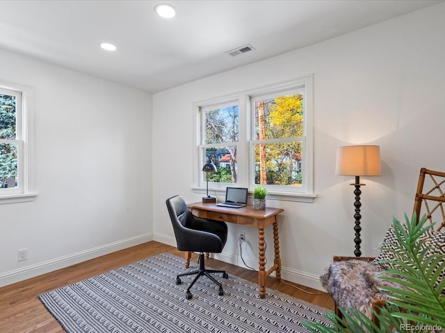 home office featuring hardwood / wood-style flooring