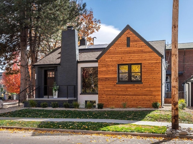 view of front of home with solar panels