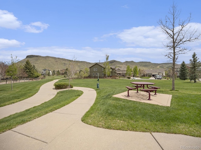 19379 W 57th Pl, Golden, CO 80403 - view of property's community with a yard and a mountain view