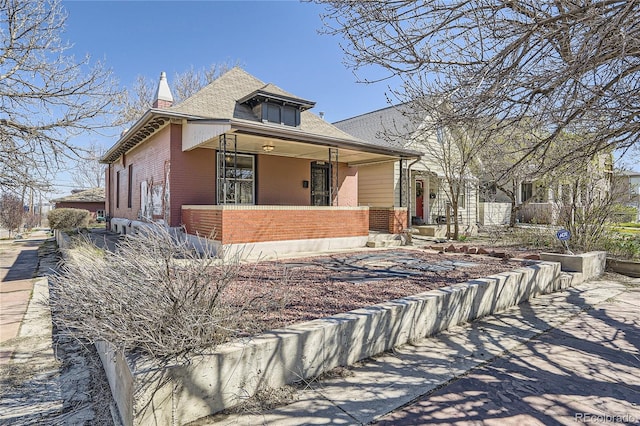 view of front of property featuring covered porch