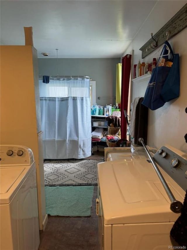 laundry room with washer / dryer