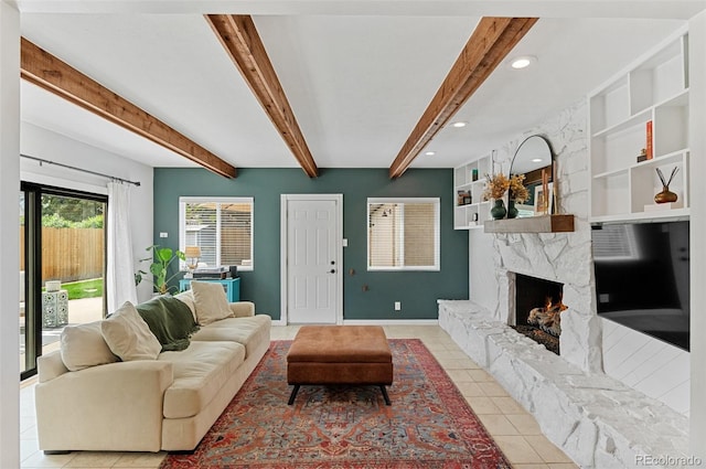 living room featuring light tile patterned flooring, a premium fireplace, baseboards, beamed ceiling, and recessed lighting