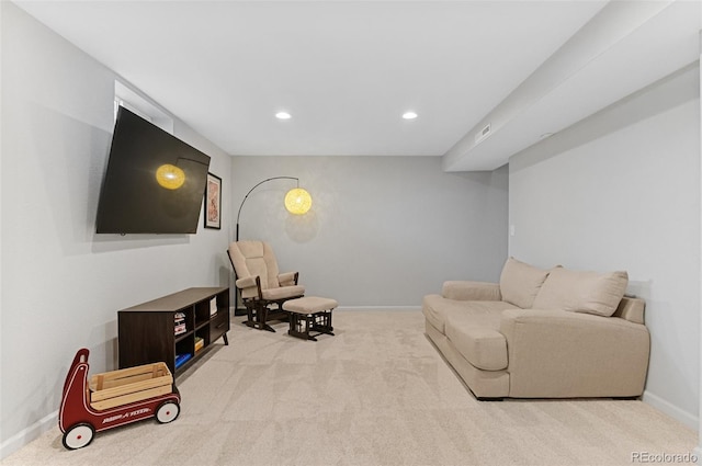 living area with carpet floors, baseboards, and recessed lighting
