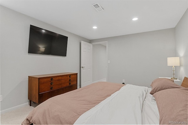 carpeted bedroom with recessed lighting and baseboards