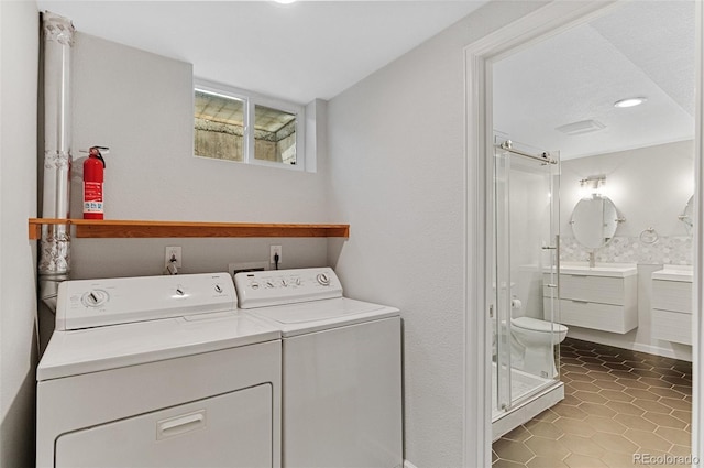 washroom with washer and dryer, recessed lighting, and tile patterned floors
