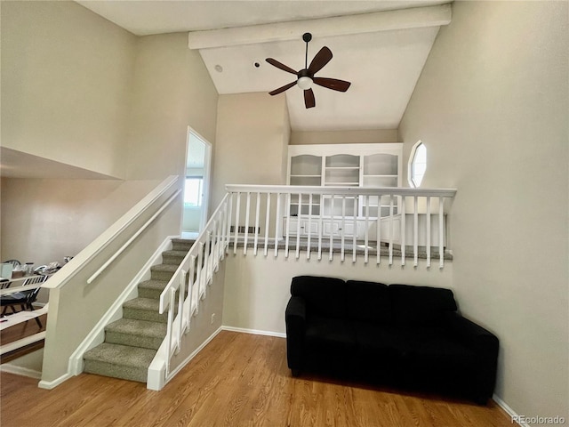 7240 W Yale Ave, Denver, CO 80227 - staircase with ceiling fan, wood finished floors, and high vaulted ceiling