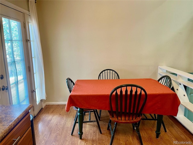 7240 W Yale Ave, Denver, CO 80227 - dining room featuring wood finished floors and baseboards