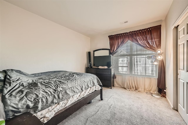 14221 E 1st Dr Unit 303, Aurora, CO 80011 - bedroom featuring carpet