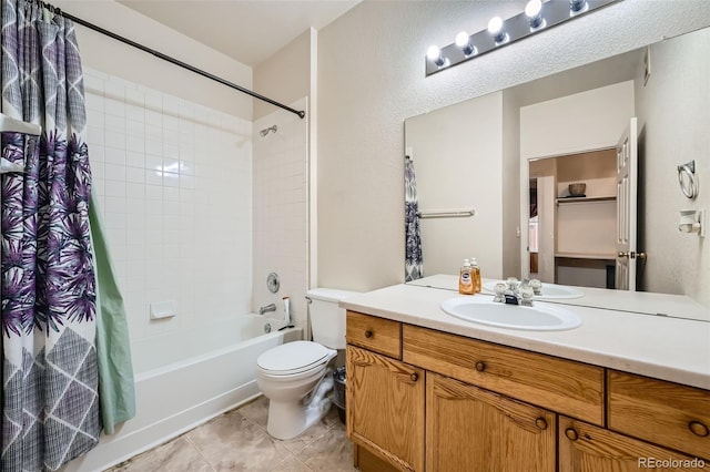 14221 E 1st Dr Unit 303, Aurora, CO 80011 - full bathroom featuring shower / bath combo, toilet, vanity, and tile patterned flooring