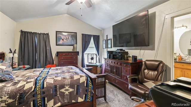1086 Johnson St, Wiggins, CO 80654 - bedroom with carpet, vaulted ceiling, ensuite bath, and ceiling fan
