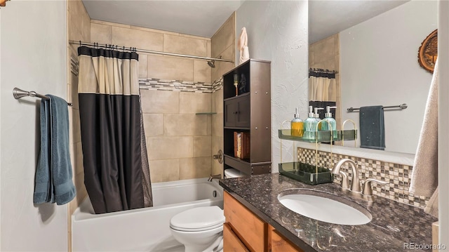 1086 Johnson St, Wiggins, CO 80654 - full bath with shower / tub combo, vanity, toilet, and tasteful backsplash