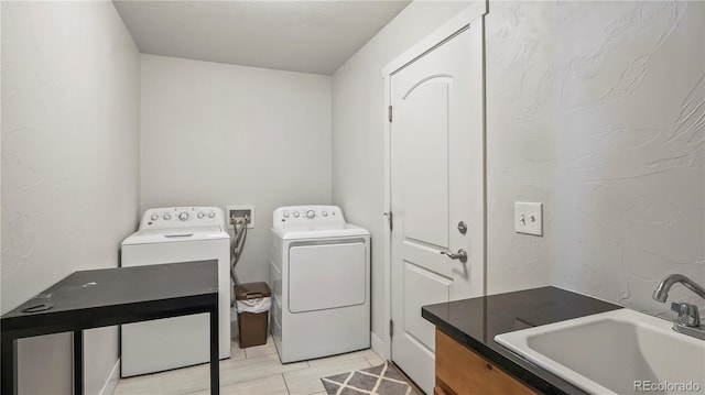 1086 Johnson St, Wiggins, CO 80654 - laundry area featuring separate washer and dryer