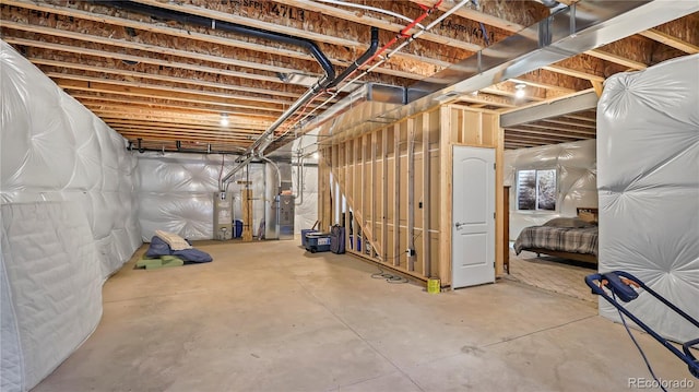 1086 Johnson St, Wiggins, CO 80654 - unfinished basement featuring water heater