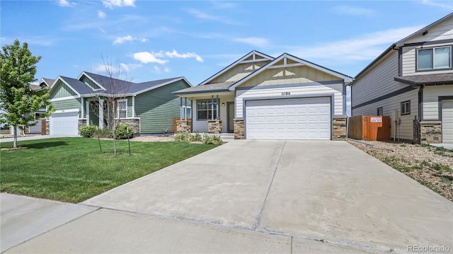 1086 Johnson St, Wiggins, CO 80654 - craftsman-style home featuring board and batten siding, stone siding, a garage, a front lawn, and driveway