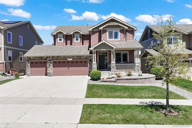 20855 Park Hollow Dr, Parker, CO 80138 - craftsman inspired home featuring covered porch, concrete driveway, stone siding, a front lawn, and roof with shingles