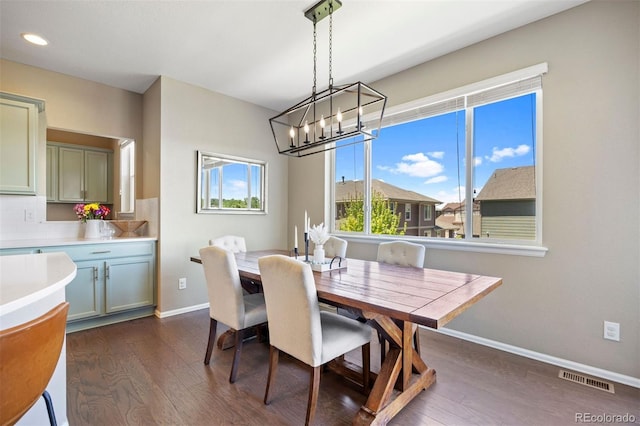 20855 Park Hollow Dr, Parker, CO 80138 - dining room featuring dark wood-style flooring, baseboards, a chandelier, and recessed lighting