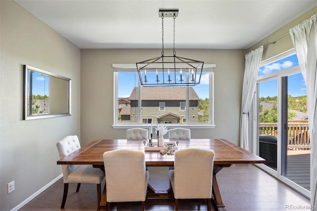 20855 Park Hollow Dr, Parker, CO 80138 - dining space with plenty of natural light, wood finished floors, and baseboards