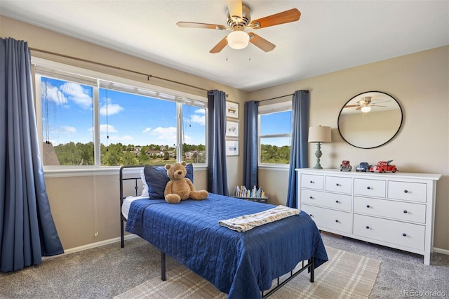 20855 Park Hollow Dr, Parker, CO 80138 - bedroom featuring light colored carpet, baseboards, and a ceiling fan