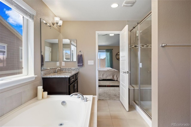20855 Park Hollow Dr, Parker, CO 80138 - bathroom featuring a shower stall, ensuite bath, vanity, tile patterned flooring, and recessed lighting