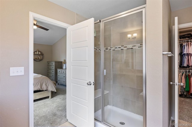 20855 Park Hollow Dr, Parker, CO 80138 - ensuite bathroom with a stall shower, a walk in closet, and a ceiling fan