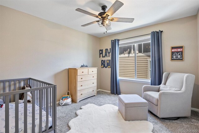 20855 Park Hollow Dr, Parker, CO 80138 - bedroom featuring carpet floors, a crib, baseboards, and ceiling fan